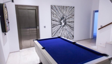 Resa estates Ibiza modern villa Cala llonga golf sale te koop playroom.jpg